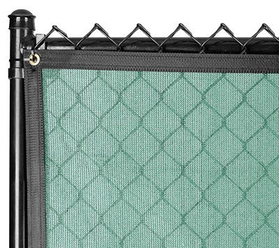 a picture of chain link fence coverd with screen