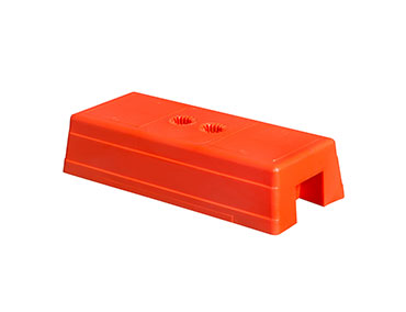 a picture of orange injection mold temporary fence feet